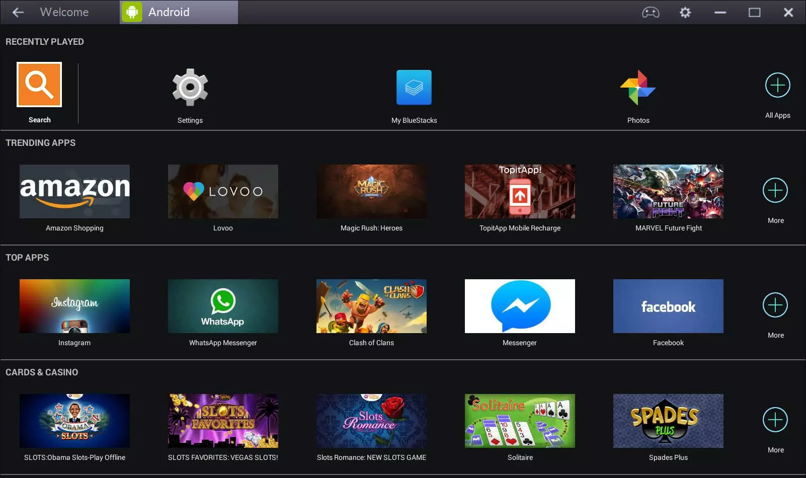 BlueStacks 2 home screen — dark grid of recently played, trending and top apps with promotional content mixed in